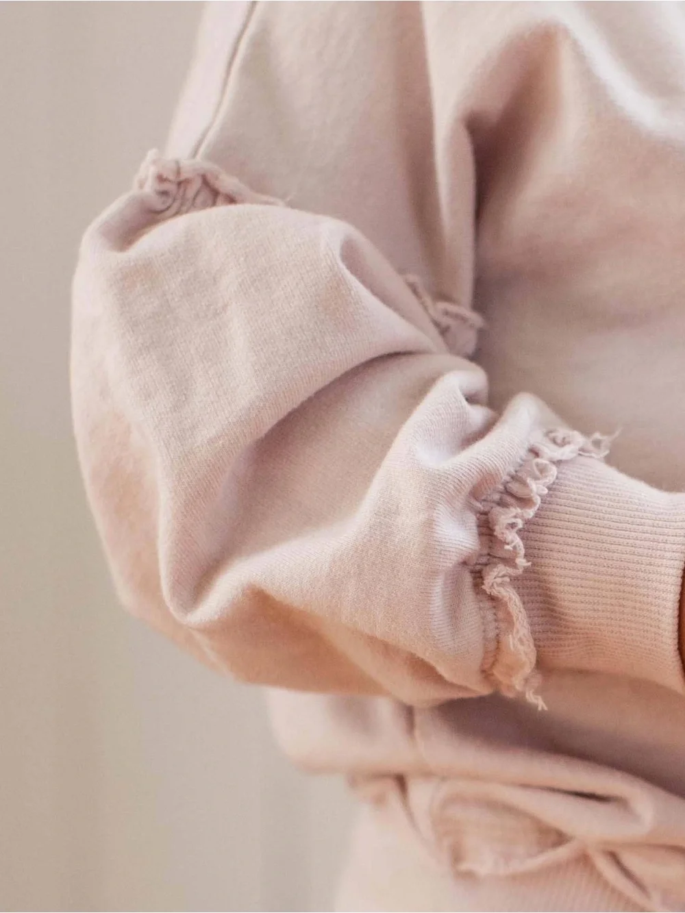 Light Pink Ruffle Sleeve Sweatshirt & Beige Flare Pants Set by Burt’s Bees